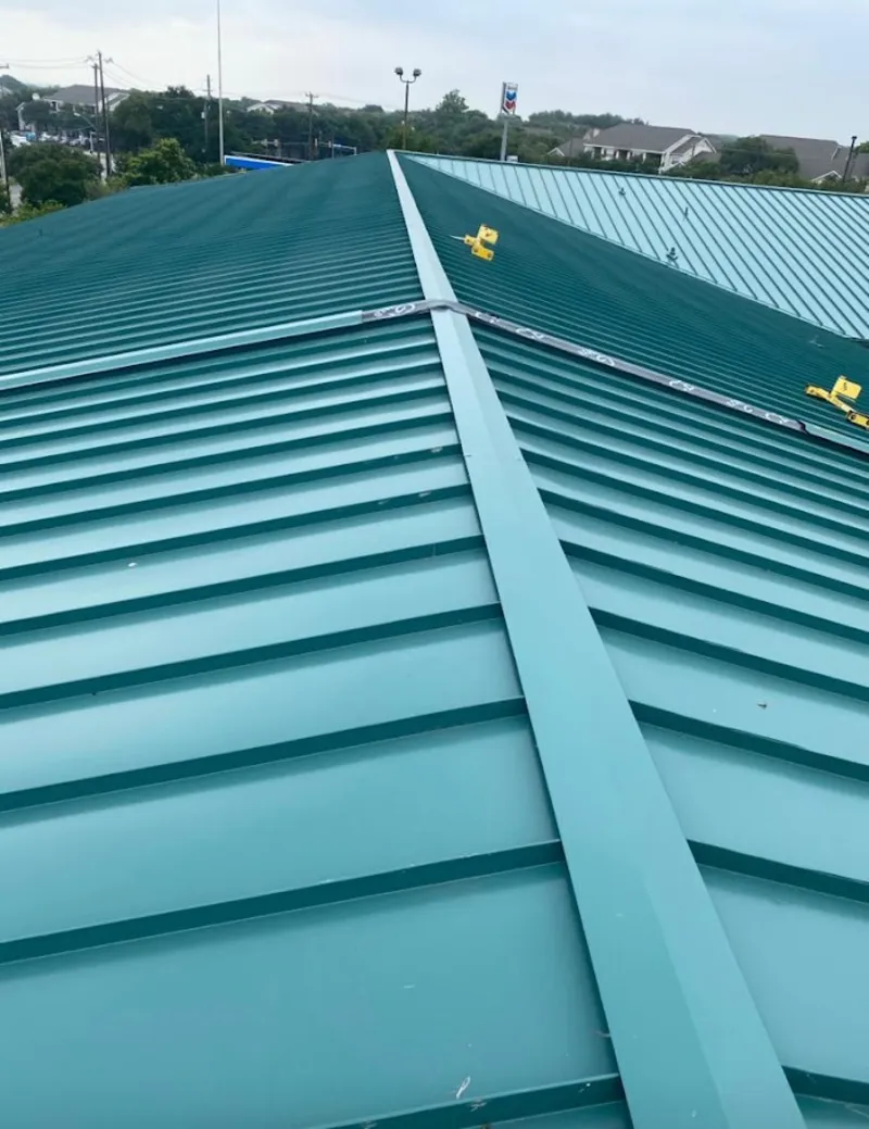 Green commercial metal roof ridge and valley for Metal Roof Repair in Upper Mount Bethel
